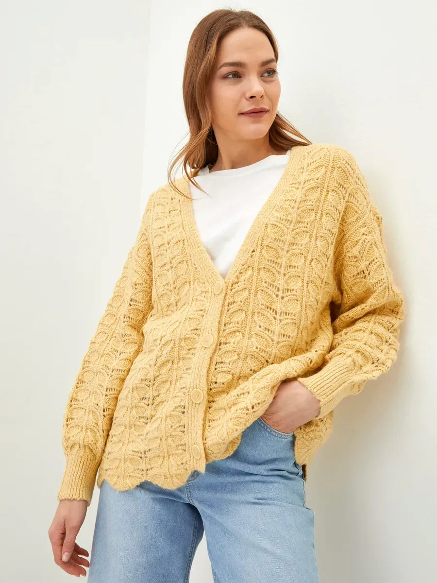 Solenne Cardigan by Lauven in warm yellow tone with textured knit and relaxed elegance.