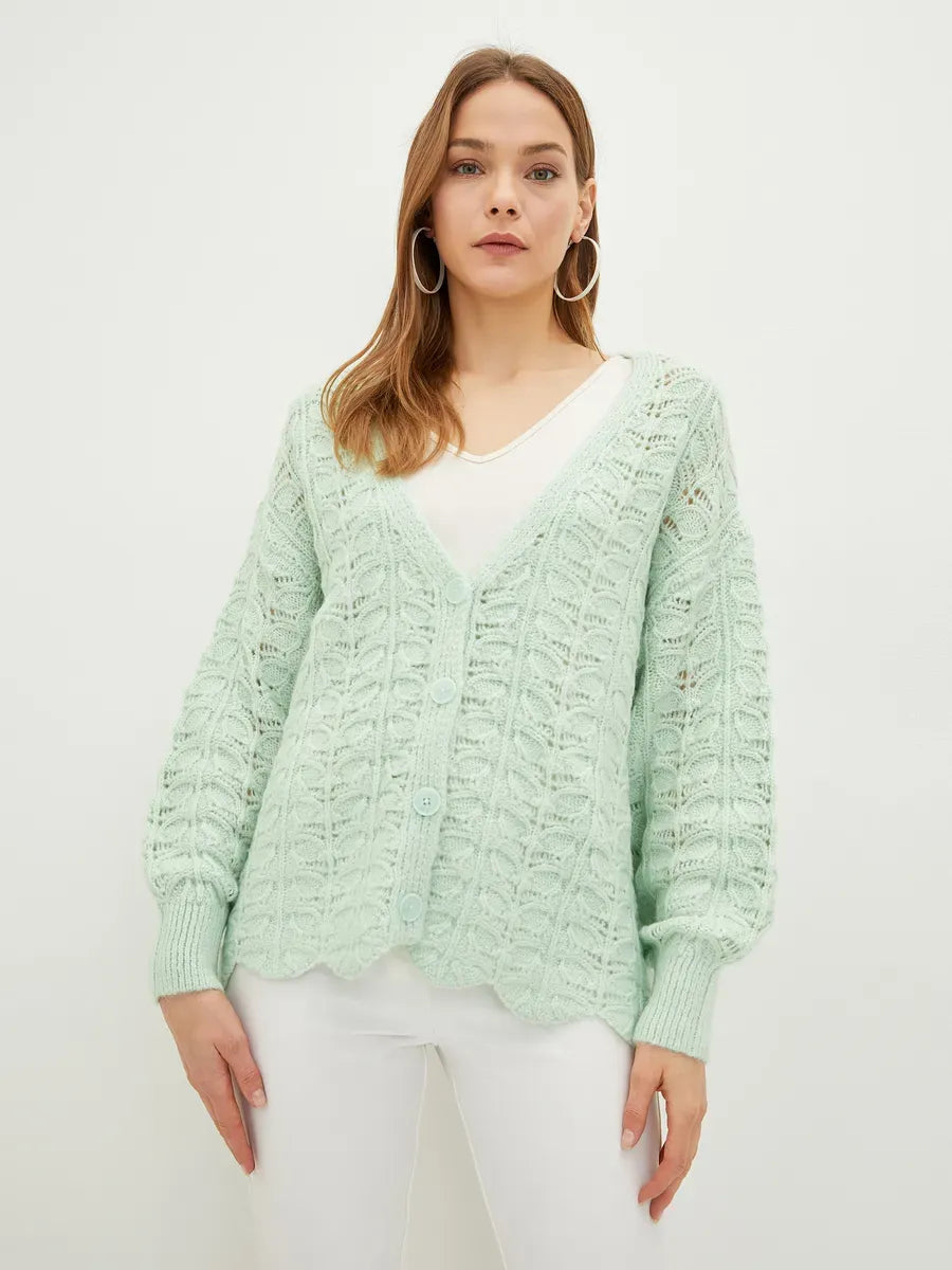 Celestia Cardigan from Lauven, featuring a soft green jacquard knit and V-neckline for versatile layering.