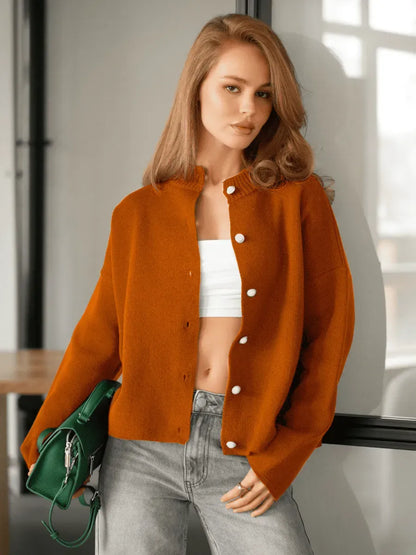 Tangelo Cardigan by Lauven in warm orange knitwear with button closure, perfect for casual and office wear.