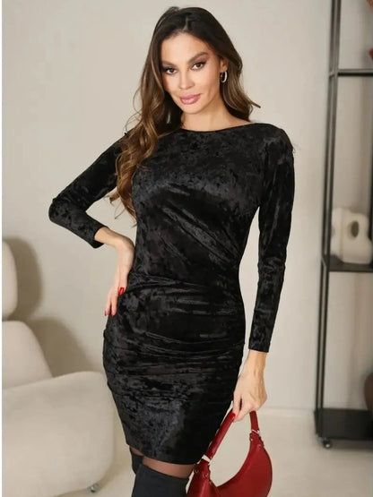 Astra Mini Dress by Lauven featuring a sleek black velvet fabric and sculpted silhouette for an elegant evening look.