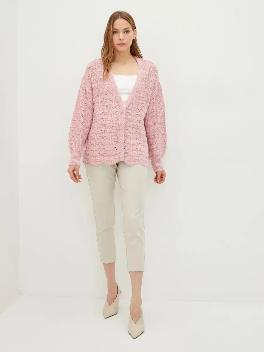 Liora Cardigan by Lauven in soft pink with jacquard knit and V-neckline, perfect for layering.