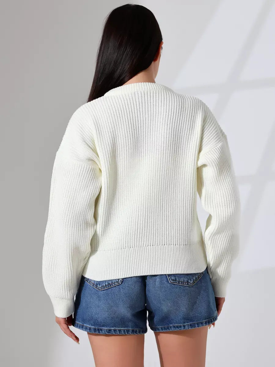 Back view of the Luna Cardigan by Lauven, showcasing elegant knitwear for women in a soft, milk color.