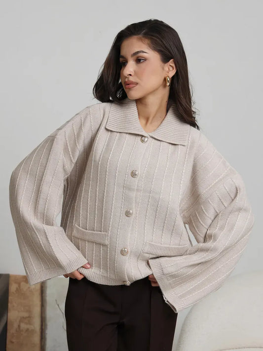 Dune Cardigan by Lauven - Soft light beige oversized knitwear with braided pattern and wide bell sleeves.