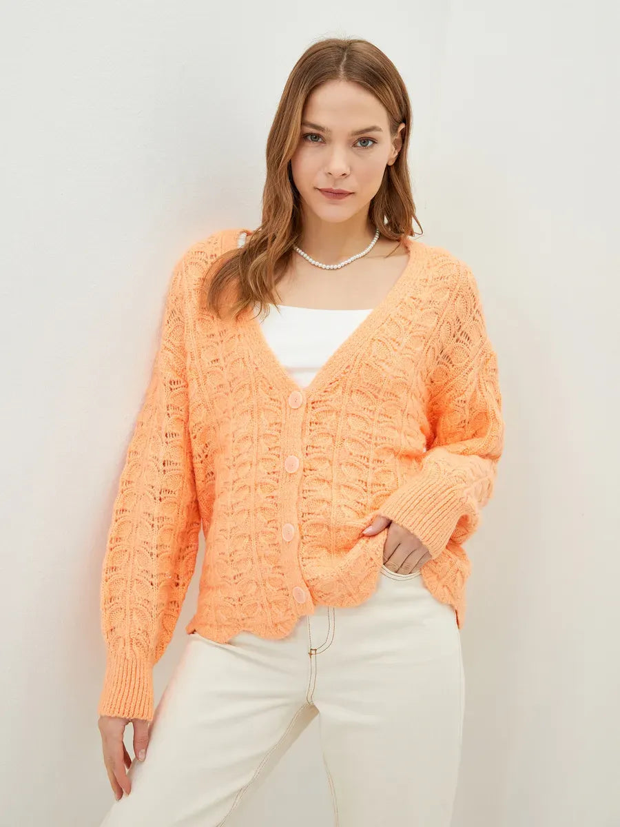 Elysia Cardigan by Lauven in soft jacquard knit, vibrant coral with a V-neckline and relaxed fit.