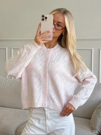 Blush Cardigan by Lauven, a soft pink knit button-up with delicate openwork lace design.