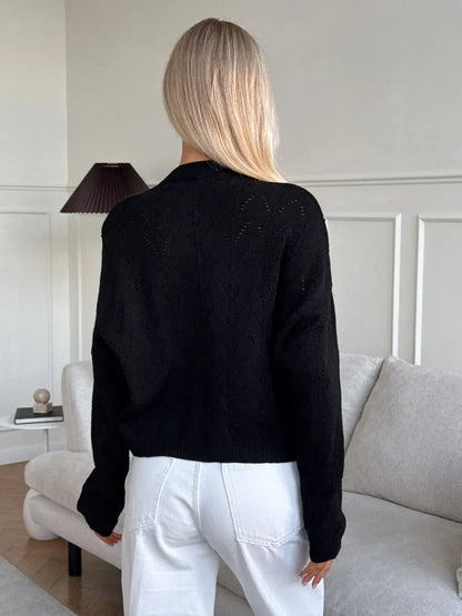 Onyx Cardigan by Lauven, elegant black knitwear showcasing a relaxed fit and soft textured fabric.