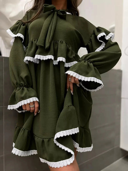 Olivea Mini Dress from Lauven featuring romantic ruffles and lace trim, perfect for chic and comfortable style.