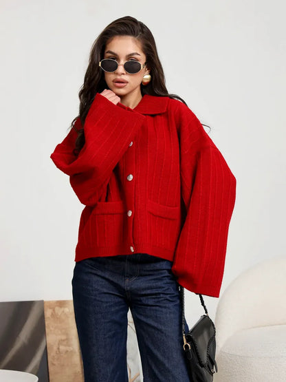 Crimson Cardigan by Lauven — Oversized red knitwear with button detail and wide sleeves, perfect for layering.