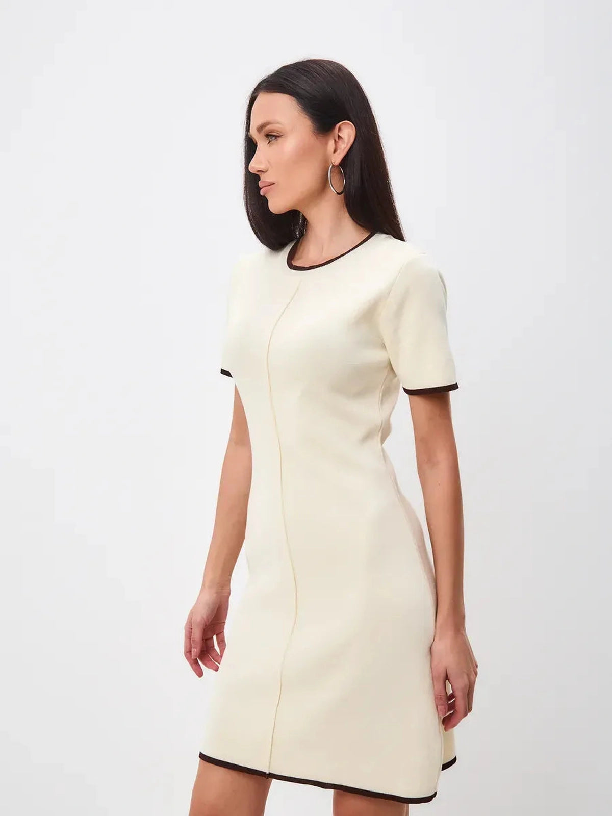 Lauven Marbella Mini Dress featuring soft neutral tones and a sleek A-line silhouette.