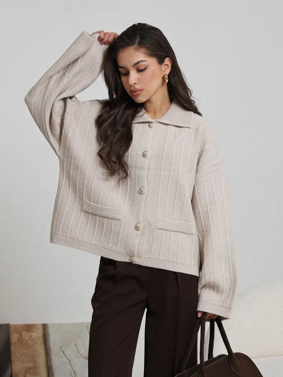 Dune Cardigan by Lauven in soft light beige, oversized knitwear with braided pattern and wide bell sleeves.