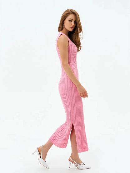 Rosalie Midi Dress by Lauven, showcasing a soft pink ribbed knit design with a side slit and V-neckline.
