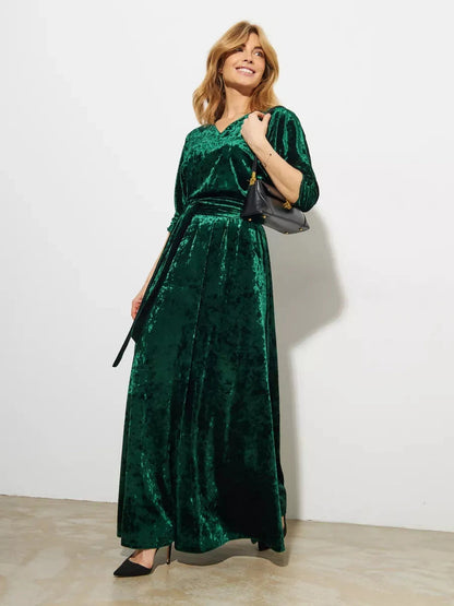 Emerelle Maxi Dress by Lauven, elegant emerald green velvet A-line gown with a soft V-neckline.