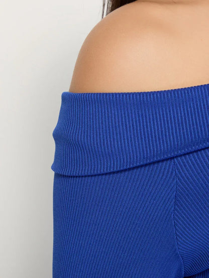 Close-up of the ribbed fabric detail of the Azure Two-Piece Set by Lauven, showcasing its off-shoulder design and elegance.