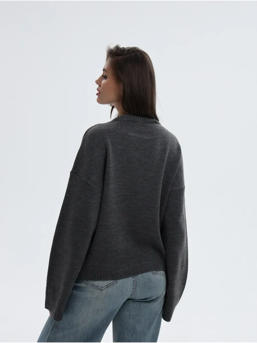 Aria Sweater by Lauven, oversized knit in anthracite gray, showcasing a stylish back view on a model.