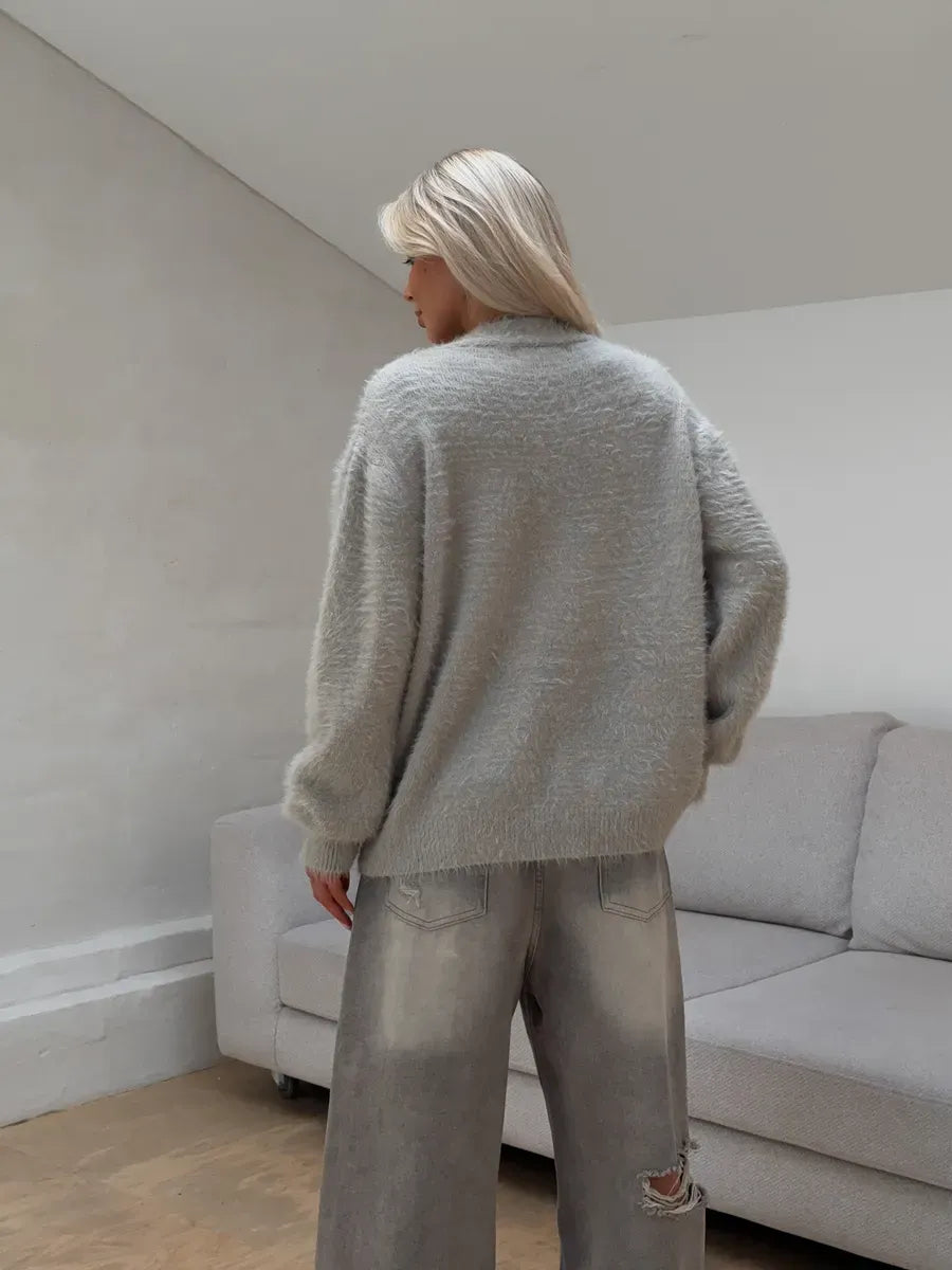 Eira Cardigan by Lauven in light gray fluffy knit, showcasing oversized style and button closure, perfect for cozy outfits.