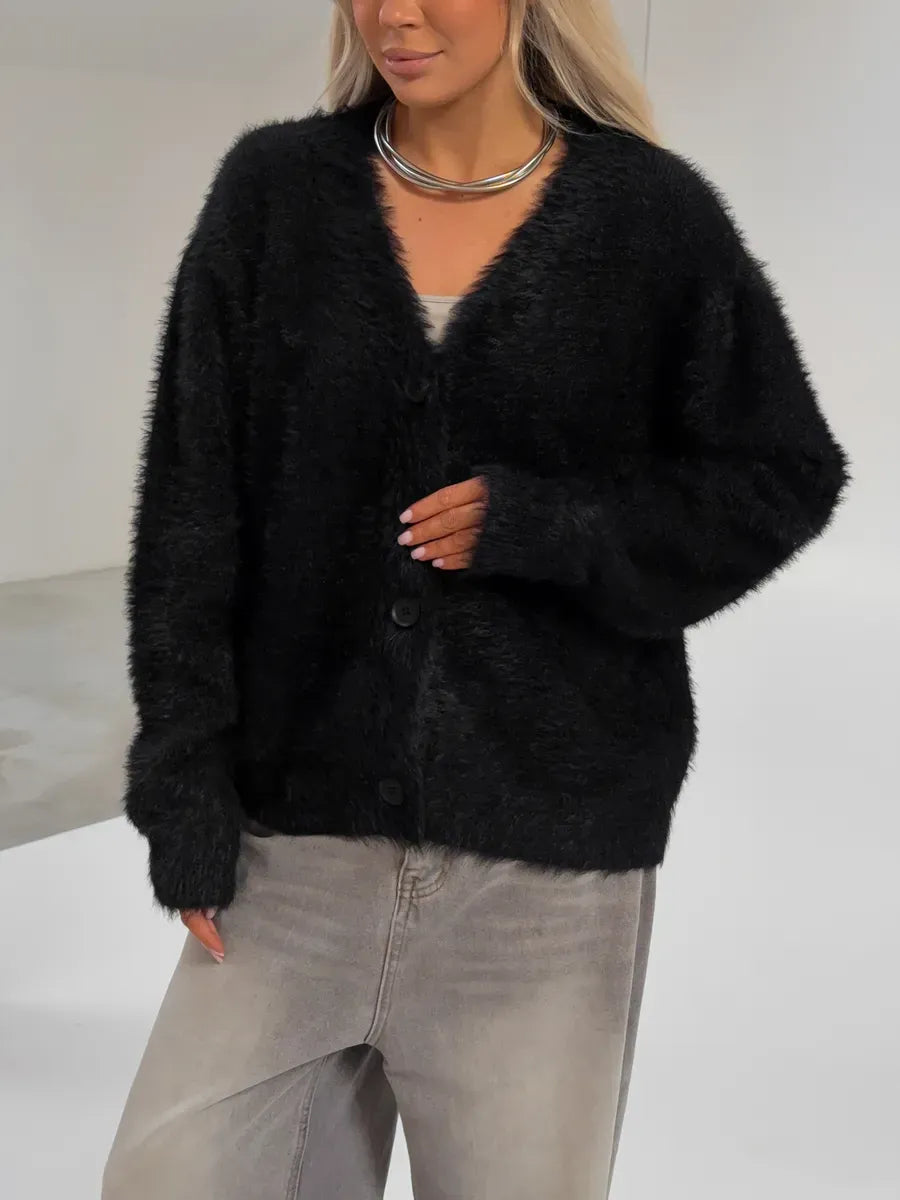 Nyx Cardigan by Lauven, oversized black fluffy knit with button closure for modern comfort and sophistication.