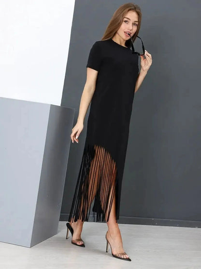 Lauven Noir Midi Dress in black with fringe hem, showcasing casual elegance and comfort for everyday wear.