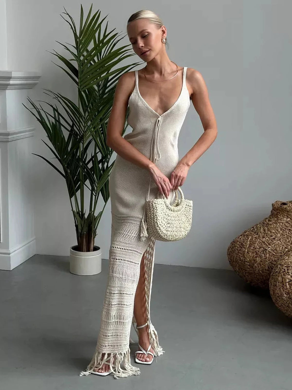 Lunara Maxi Dress by Lauven showcases a soft knit texture and openwork elegance, perfect for warm-weather styling.