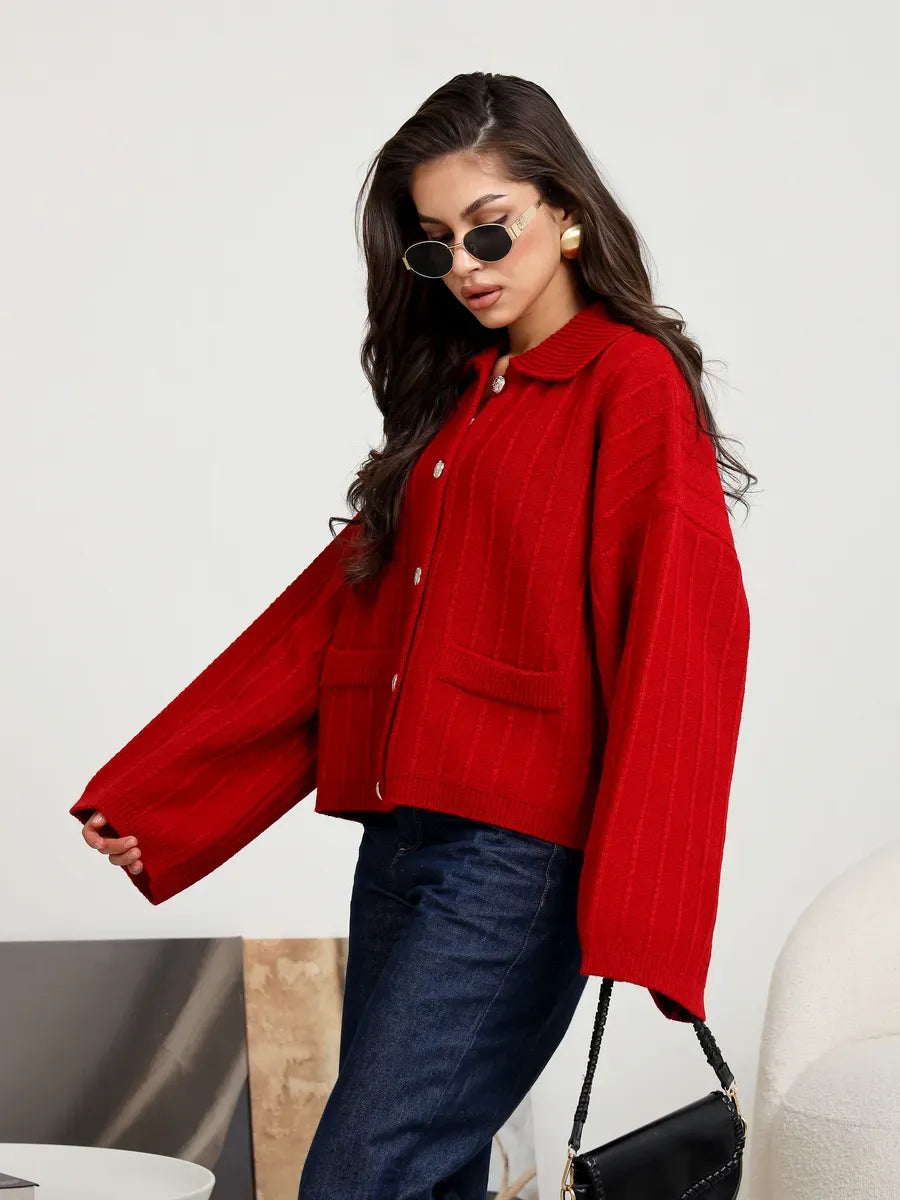 Crimson Cardigan by Lauven - Bold red oversized knitwear with braided pattern, perfect for vibrant layering.