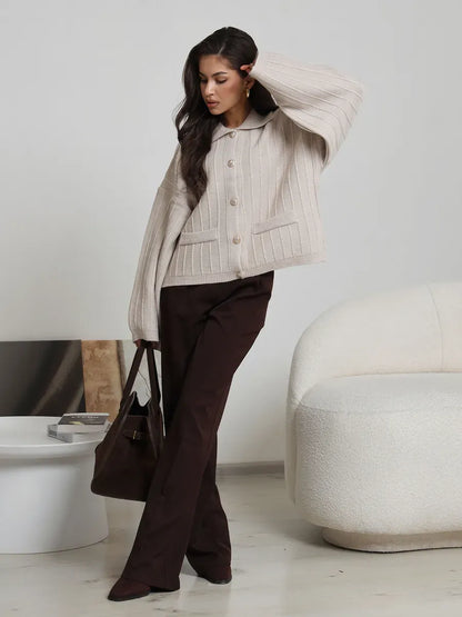 Dune Cardigan by Lauven - Soft light beige oversized knitwear with braided pattern and wide bell sleeves.