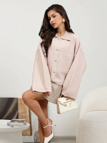 Serene Cardigan by Lauven - Elegant oversized knitwear in soft powder pink with braided detail.