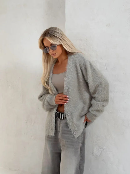 Eira Cardigan by Lauven, oversized light gray fluffy knit with button closure, styled with casual wear.