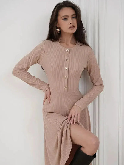 Sculpted Ease Midi Dress in ribbed knit, featuring gold-tone buttons and a waist-defining fit in a smooth beige hue.