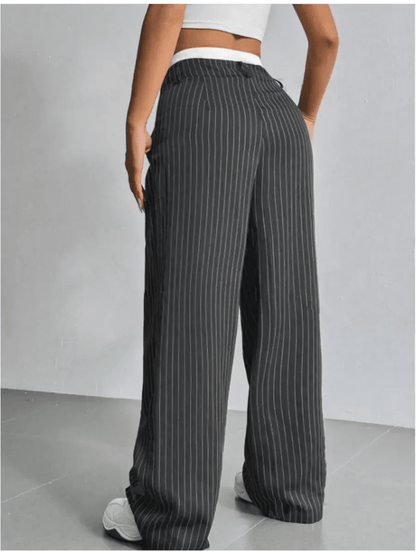 Luna Pants by Lauven, elegant high-waist wide-leg trousers with a subtle pinstripe pattern.