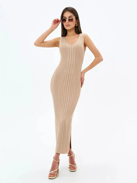 Sahara Midi Dress by Lauven in beige, featuring a ribbed knit design, sleeveless V-neckline, and elegant side slits.