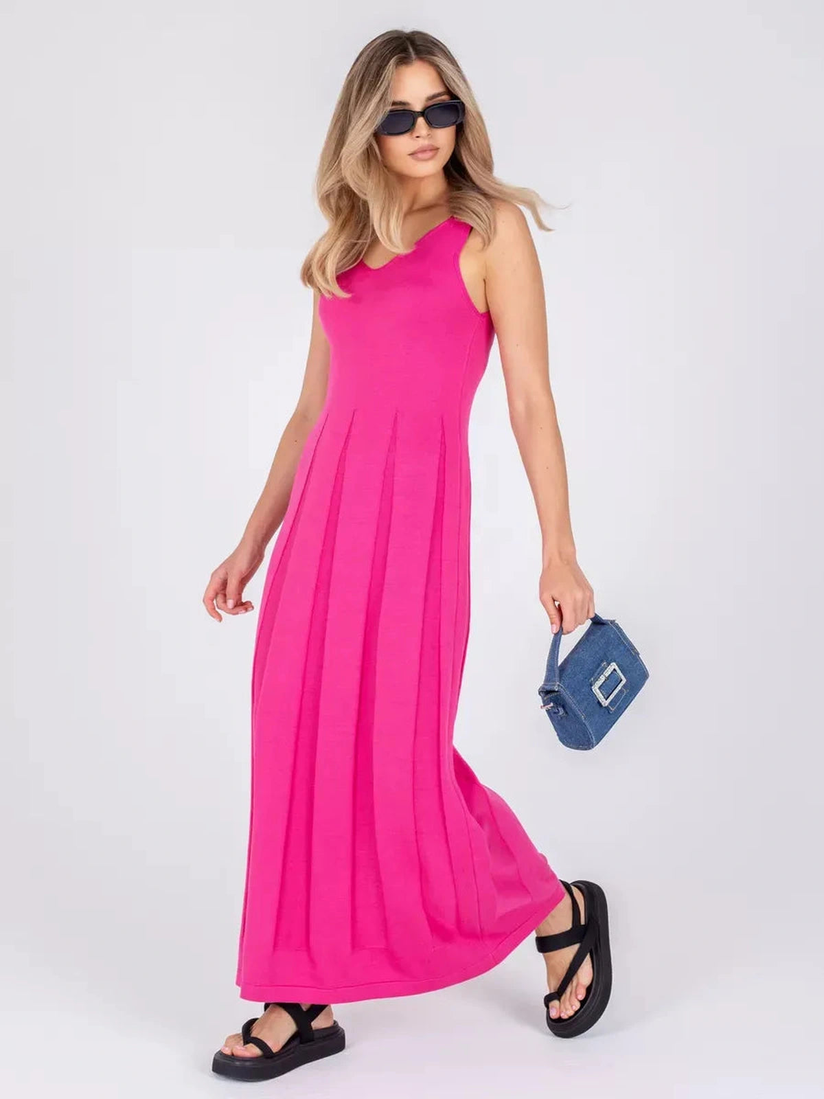 Lyra Maxi Dress by Lauven, vibrant fuchsia knit dress with sleek A-line silhouette on model.