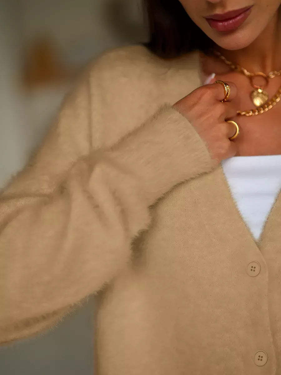 Camelia Cardigan by Lauven, plush oversized knitwear with button closure, showcasing a beige tone for stylish comfort.