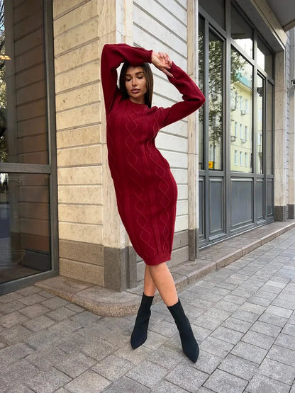 Model showcasing the Crimson Midi Dress by Lauven, a burgundy textured knit sweater dress, perfect for autumn.