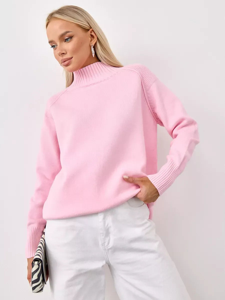 Rosette Sweater by Lauven in oversized pink cashmere knitwear with high neck design.