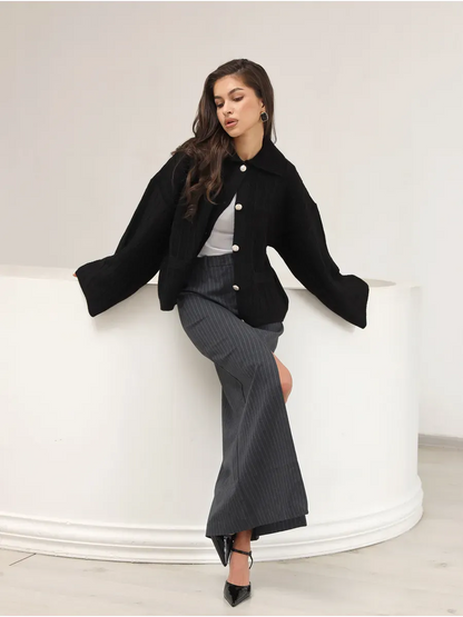 Onyx Cardigan by Lauven, stylish black oversized knitwear with wide bell sleeves and a sophisticated look.