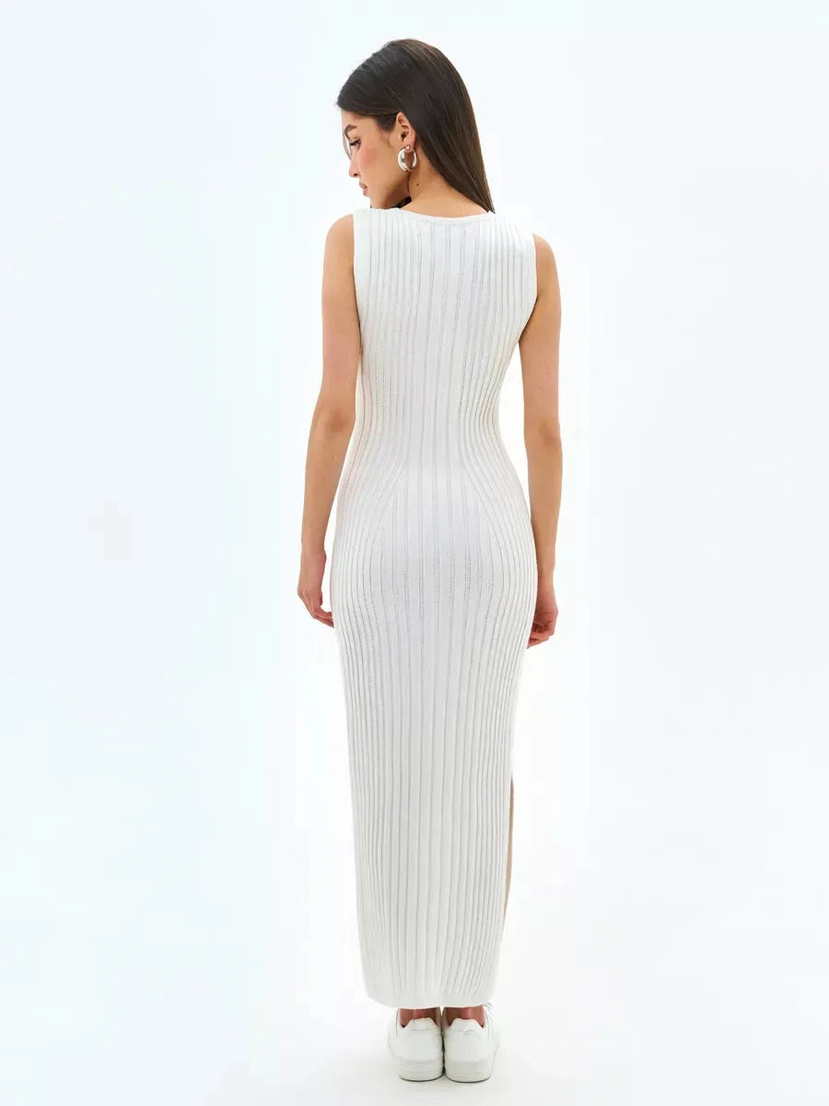 Aria Midi Dress by Lauven featuring a sleeveless ribbed design in ivory, showcasing a flattering silhouette from the back.