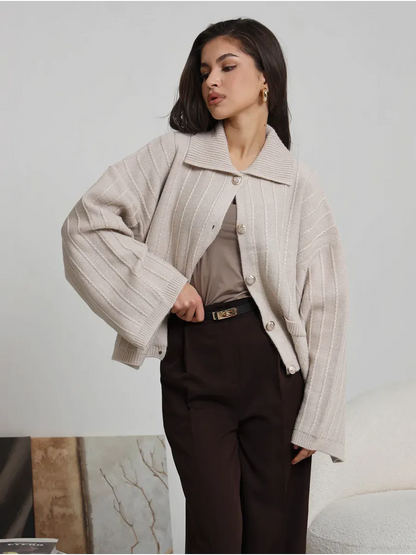 Dune Cardigan by Lauven in soft light beige, oversized knitwear with wide bell sleeves and braided pattern.