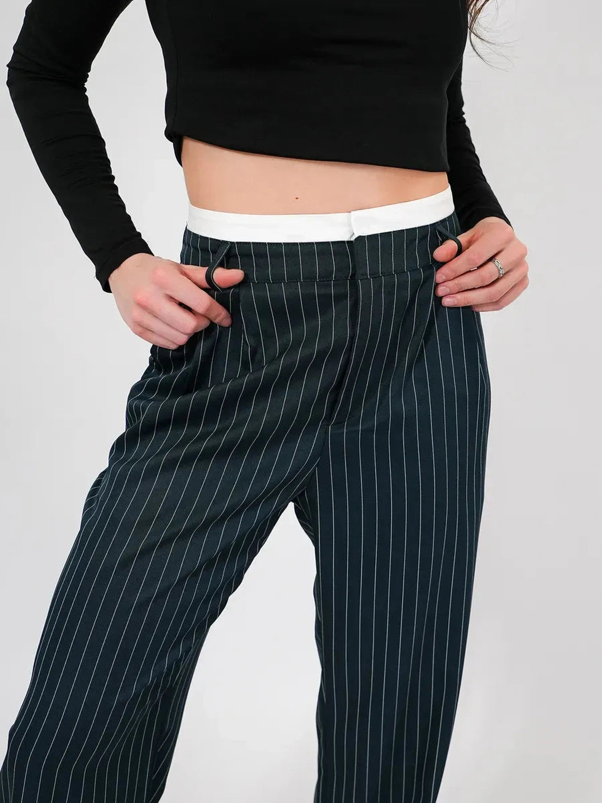 Siri Pants by Lauven, featuring high-waist wide-leg design and pinstripe pattern in deep green.