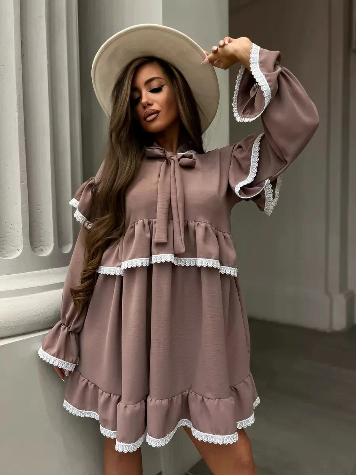 Aurora Mini Dress by Lauven featuring soft ruffles and lace trim in a stylish beige color.