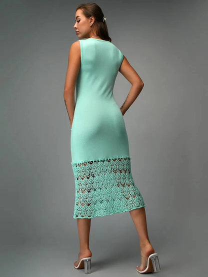 Lunara Midi Dress by Lauven in mint crochet, showcasing a figure-hugging silhouette and airy lace hem.