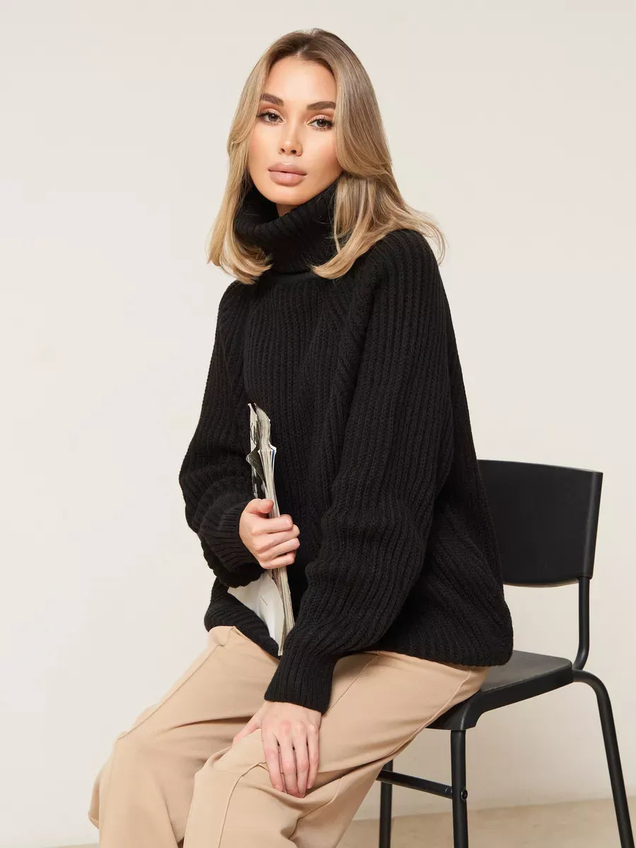 Onyx Sweater by Lauven, oversized black knitwear with turtleneck, perfect for winter fashion.
