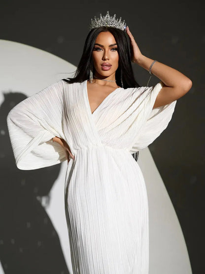 Selene Midi Dress by Lauven featuring elegant pleats, flowing silhouette, and deep V-neckline.