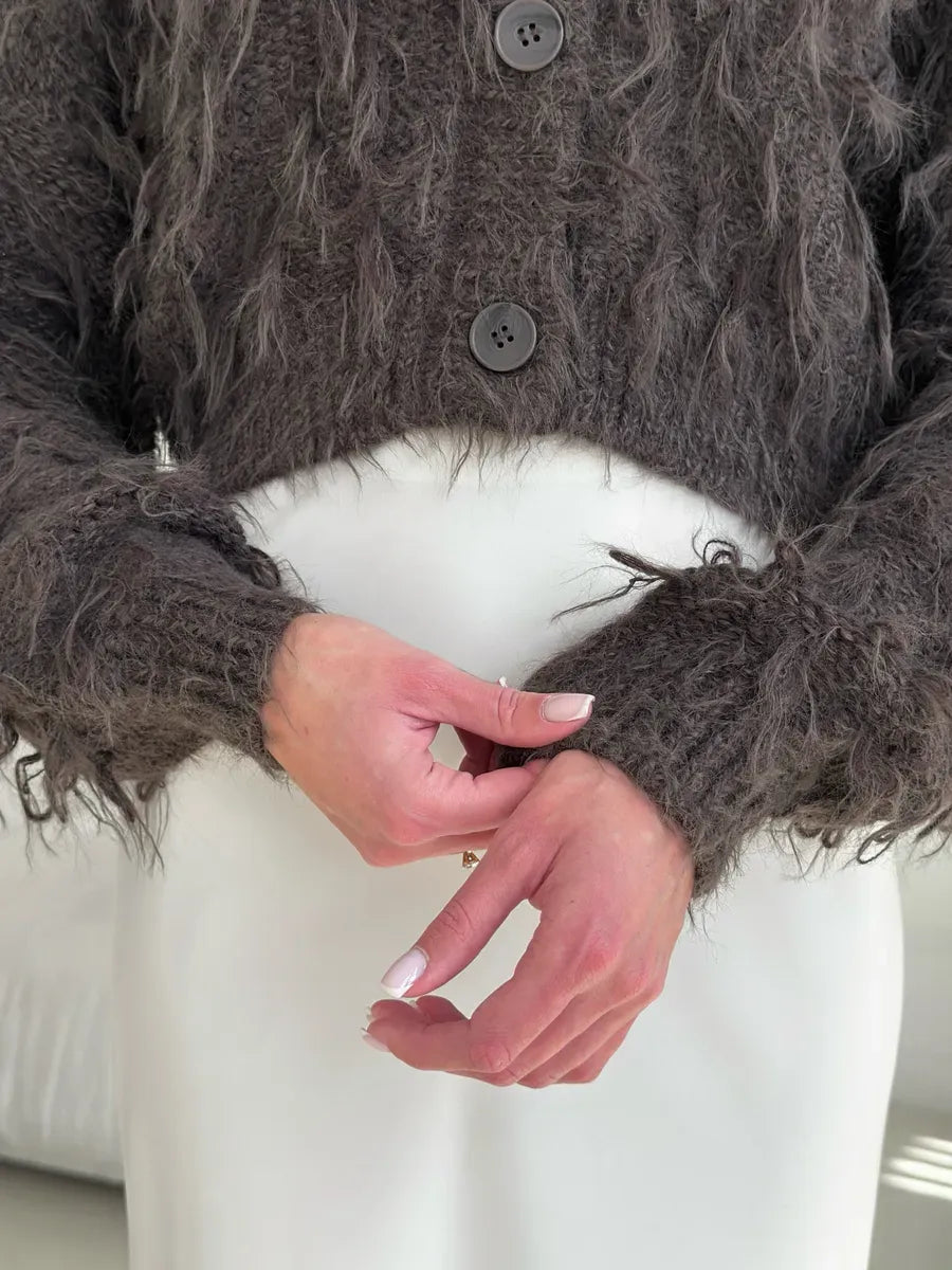 Espresso Cardigan by Lauven, cropped oversized brown bouclé knit with feathered fringe detail.