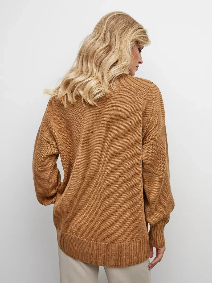 Marlo Sweater by Lauven, oversized women's knit in warm camel with asymmetric hem, showcasing cozy elegance from the back.