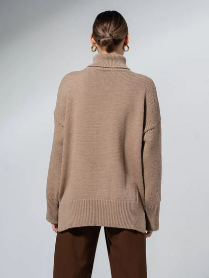 Back view of the Capri Sweater by Lauven, an oversized knit with a turtleneck collar in warm cappuccino shade.