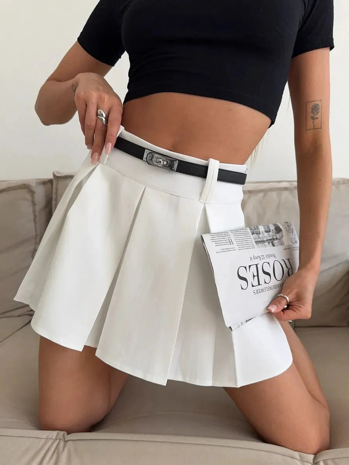 Capri Mini Skirt by Lauven, high-waisted pleated white skort with built-in shorts, perfect for stylish comfort.