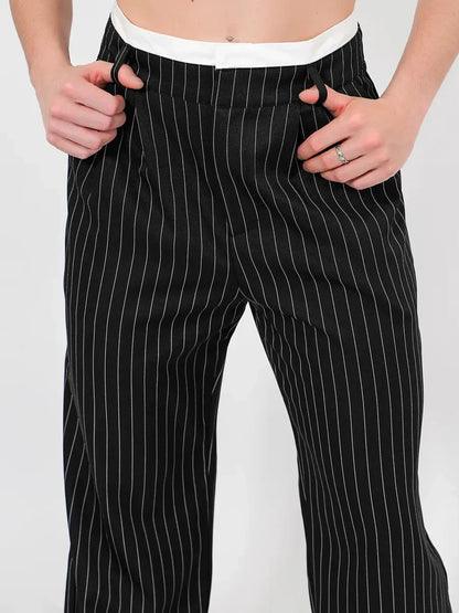 Orion Pinstripe Pants by Lauven, showcasing a high-waist wide-leg silhouette with elegant pinstripes.