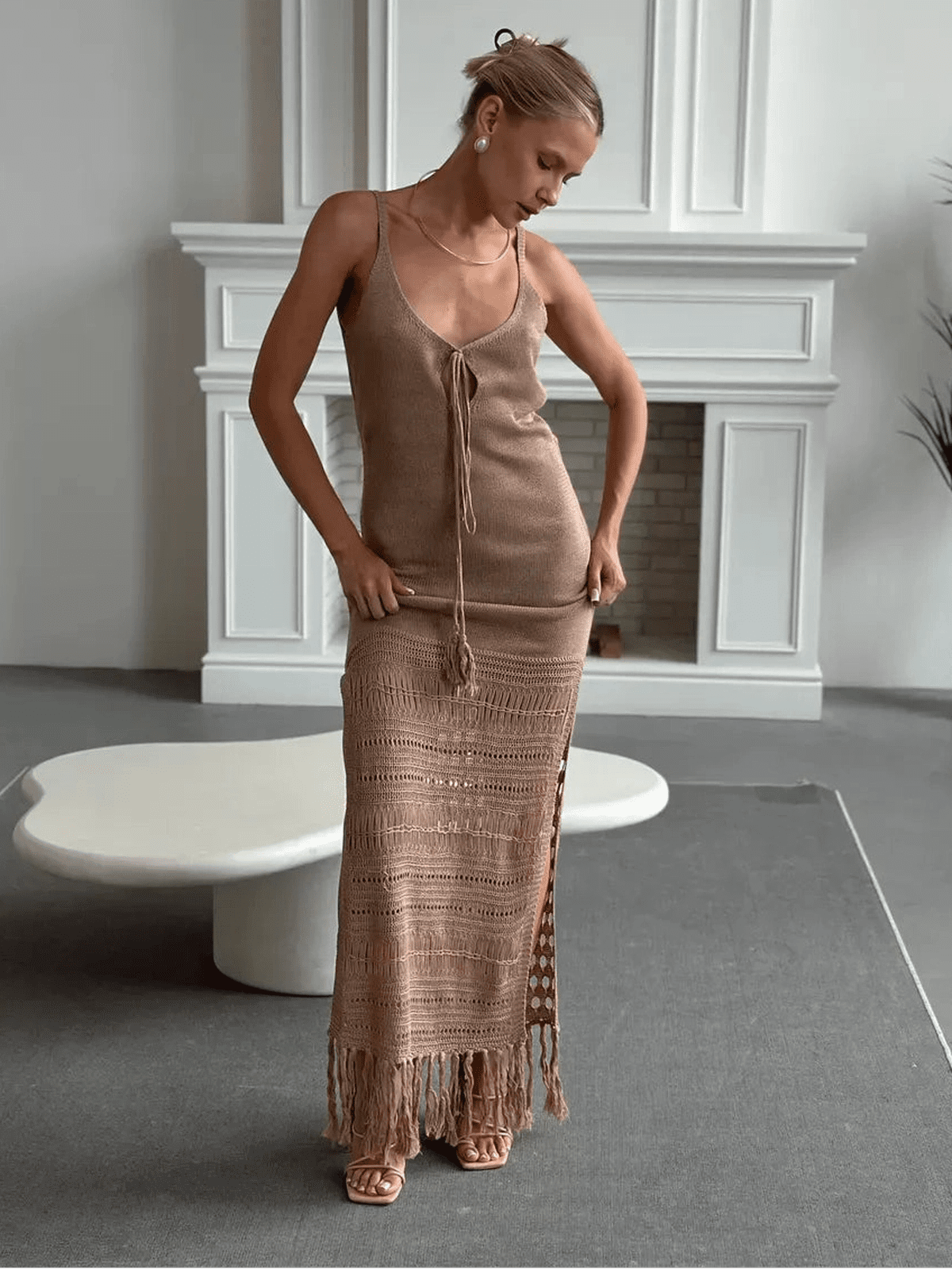 Calysta Maxi Dress by Lauven showcasing soft knit texture and side-slit elegance in a refined beige tone.
