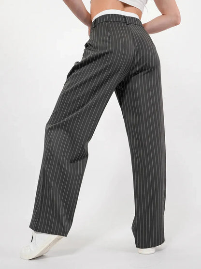 Luna Pants by Lauven: high-waist wide-leg trousers with subtle pinstripes, designed for elegance and comfort.