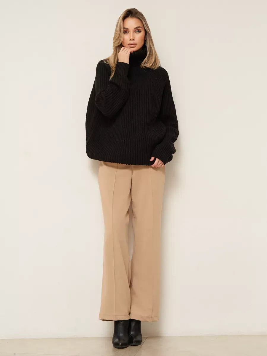Onyx Sweater by Lauven, oversized black knitwear with turtleneck, perfect for winter style and comfort.
