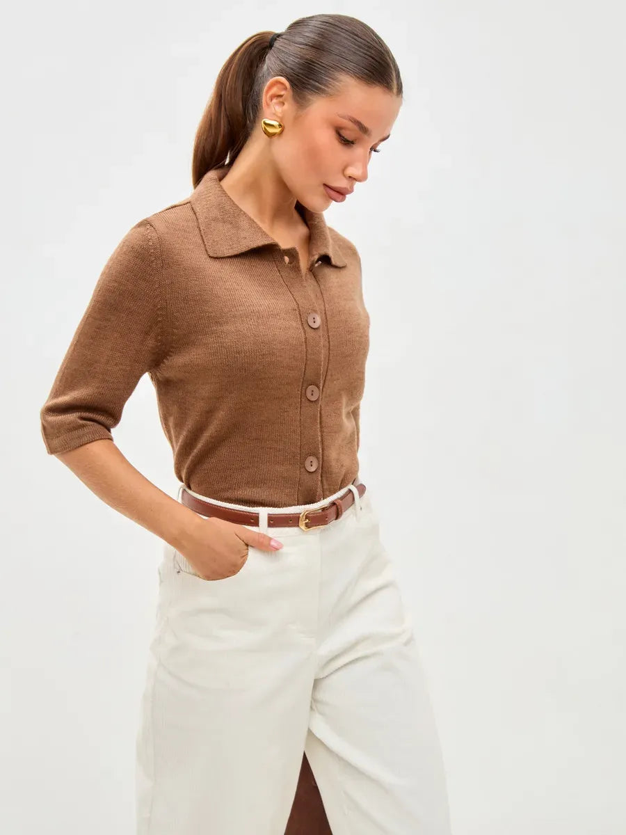 Model wearing the Marin Cardigan by Lauven, a lightweight brown wool blend knitwear with button closure.